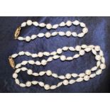 Mikimoto Chinese freshwater & cultured pearl necklace and matching bracelet with 9ct gold floral