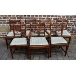 Set of 7 rush seated country chairs in mixed wood including carver