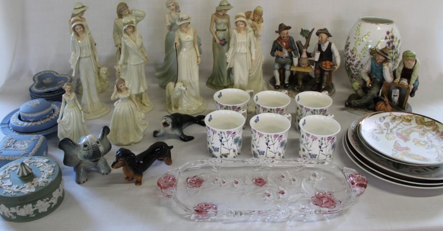 Selection of ceramics including Regal lady figurines, set of 7 Royal Botanical Garden mugs,