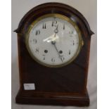 19th century dome top mantel clock in a mahogany veneer case Ht 35cm W 26cm