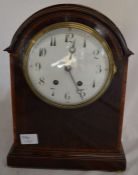 19th century dome top mantel clock in a mahogany veneer case Ht 35cm W 26cm