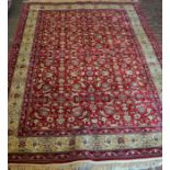 Rich red ground pile cashmere floral carpet with golden border 228cm by 156cm