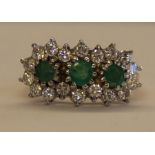 18ct gold emerald (0.36ct) & diamond (0.63ct) triple cluster ring 4.4g size P/Q