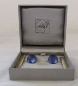 Boxed Lalique blue crystal cuff links and a pair of collar straighteners