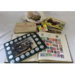 Small stamp album containing World stamps, box of Bryant & May's book matches, Brooke Bond picture