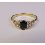 Tested as 9ct gold sapphire and diamond ring, size P/Q weight 2.7 g