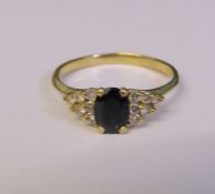 Tested as 9ct gold sapphire and diamond ring, size P/Q weight 2.7 g