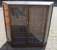Bookcase with leaded glass panels Ht 101 L108 D 26cm
