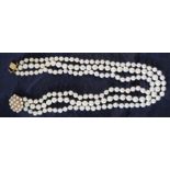 Mikimoto three row cultured pearl choker necklace with 9ct gold floral push piece clasp, total