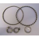 2 silver twist bangles D 6.5 cm, pair of silver earrings and a silver ring size K, total weight 0.54