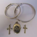 2 silver christening bangles, 2 crosses and a locket, total weight 0.46 ozt