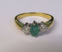 18ct gold emerald and diamond ring, each diamond approximately 0.20 ct, size P, total weight 3.3 g