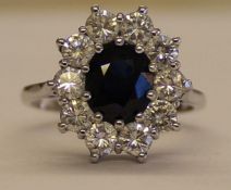 18ct white gold sapphire & diamond cluster ring with central sapphire approximately 1.70ct