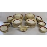 Pallisy burgundy and gold part dinner service, approximately 55 pieces