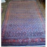 Thick pile blue ground Persian beshear carpet (stitched across the centre) 310cm by 165cm