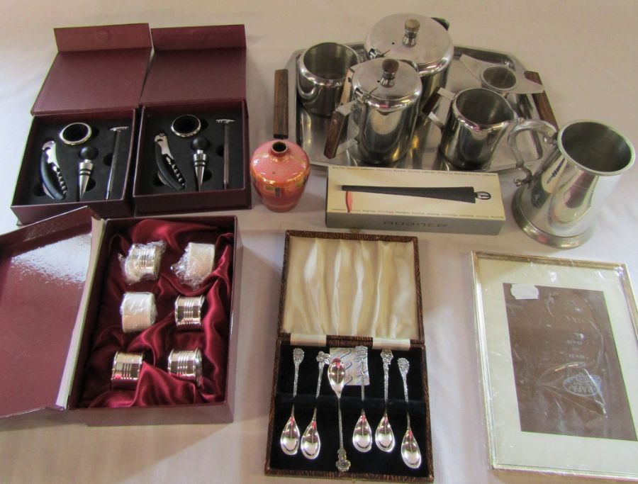 Stainless steel tea set, tankard, silver plated set of napkin rings and teaspoons, wine gifts,