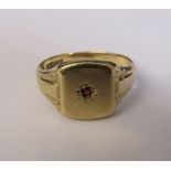 9ct gold signet ring with garnet accent size V/W weight 6.7 g