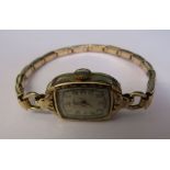 14ct gold Ladies Bertmar swiss 15 jewel cocktail watch with gold plated elasticated strap
