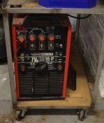 Cebora Tig Star 16-p square wave welding machine with foot peddle & accessories. This Lot is at a