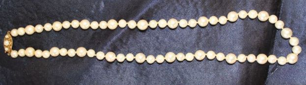 Mikimoto cultured pearl necklace with 9ct gold clasp hallmarked Birmingham 1986 set with 3