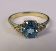 9ct gold aquamarine and diamond ring, size N, weight 1.9 g (aquamarine 6 mm x 7 mm)