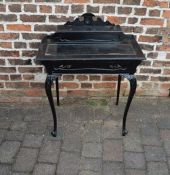 Small late Victorian ebonised writing desk on cabriole legs