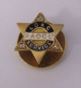 18ct gold and enamel pin badge with diamond accents - A.A.O.C Ltd long service awarded to W A