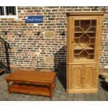 Glazed pine corner cupboard and a pine coffee table