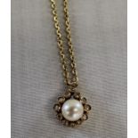 18ct gold Mikimoto pearl and diamond set pendant (4.0g) on 9ct gold chain (4.0g)