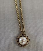 18ct gold Mikimoto pearl and diamond set pendant (4.0g) on 9ct gold chain (4.0g)