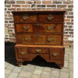 Queen Anne walnut chest on stand on bun feet with walnut veneer with feather banding to top &