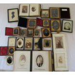 Collection of Victorian daguerreotype photographic portraits in frames (most with names and dates