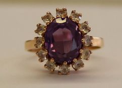 Tested as 14k cz & possibly topaz cluster ring, size O/P