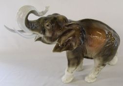 Large Royal Dux style ceramic elephant with incised mark 378 / V, 33cm high, 47cm wide