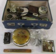 Small suitcase containing various items inc perfume bottle, hand mirror, wallet, fan, inkwell and