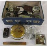 Small suitcase containing various items inc perfume bottle, hand mirror, wallet, fan, inkwell and