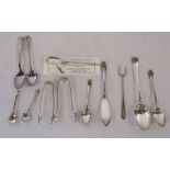 Various silver teaspoons, pickle fork, butter knife, sugar tongs, salt spoons total weight 3.48