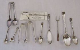 Various silver teaspoons, pickle fork, butter knife, sugar tongs, salt spoons total weight 3.48