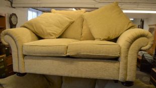 Front sprung 2 seater sofa. Approximate length 183cm