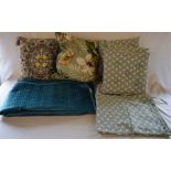 2 elaborate cushions, blanket, 4 patio chair cushions & a matching table cloth (all as new)