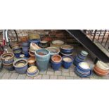 Large quantity of approximately 50 garden planters & assorted saucers
