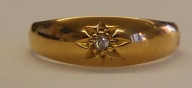 Tested as 18ct gold ring with small diamond accent stone wt 2.2g, size K/L