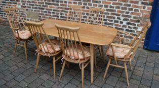 Ercol dining table 150cm by 76cm with 6 dining chairs including 2 carvers