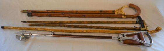 5 walking sticks & an adjustable shooting stick