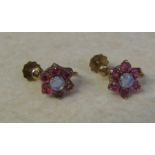 Pair of 9ct gold ruby and opal cluster earrings, weight 2.3 g, diameter 10 mm, screw fastening