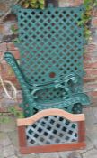 Pair of cast iron bench ends & a patio table top