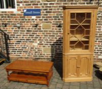 Glazed pine corner cupboard and a pine coffee table