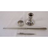 Silver pencil London 1965, napkin ring Sheffield 1898 weight 0.63 ozt, candlestick Birmingham 1979 H