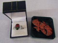 Silver dress ring size Q and a coral brooch 6.5 cm x 4.5 cm (af)