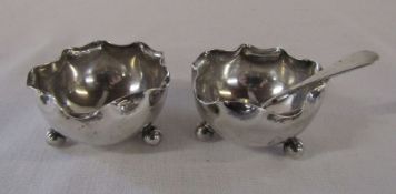 Pair of silver salts Chester 1901 weight 1.05 ozt with a silver plated spoon